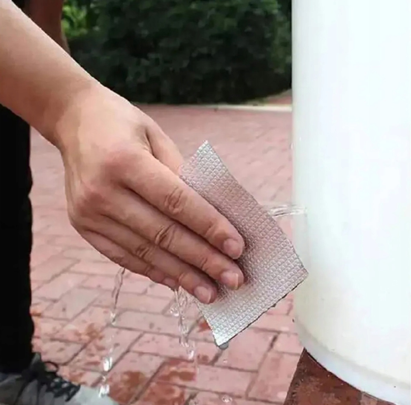 Banda adeziva pentru reparatii, Zola, din aluminiu si cauciuc, lungime 5 m, argintie Banda adeziva pentru reparatii, Zola, din aluminiu si cauciuc, lungime 5 m, argintie